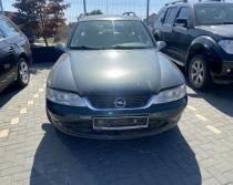 Dezmembrez piese caroserie, motor, cutie viteze, suspensie Opel Vectra B Combi (31) 1.6 benz 2001, Z16XE