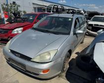 Dezmembrez piese caroserie, motor, cutie viteze, suspensie Ford Focus 1 Combi 1.8 TDDI, C9DA